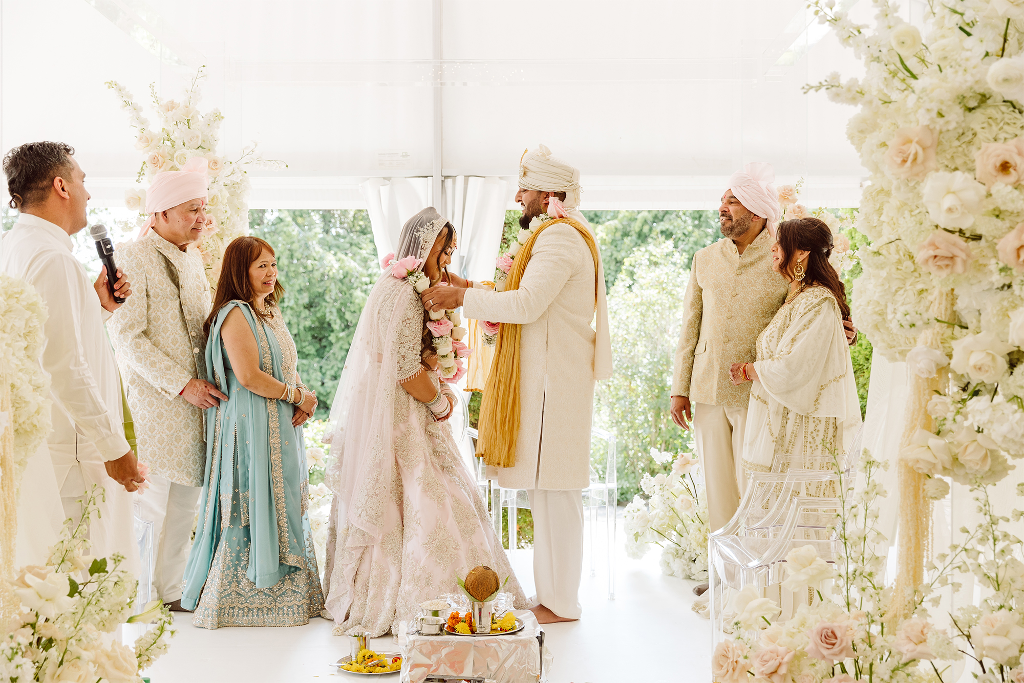 Multicultural Wedding ceremony with pink decor and wedding details