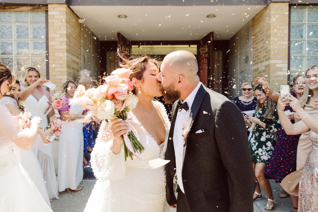 vibrant ceremony wedding photography outside of a church
