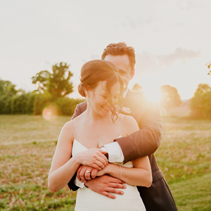 outdoor tent wedding on southern ontario at sunset